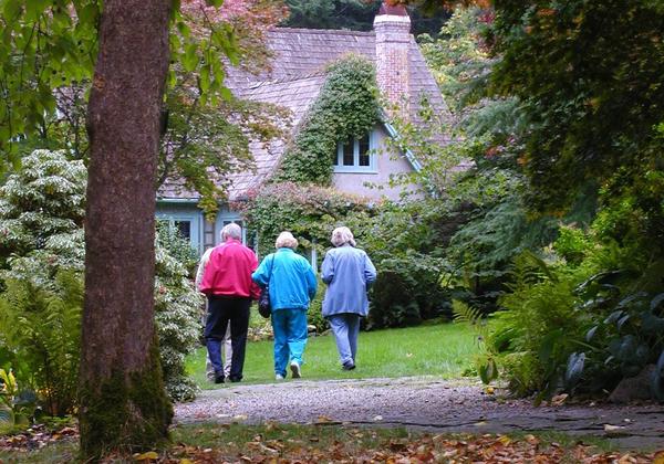 People walking to the Milner Gardens and Woodland house